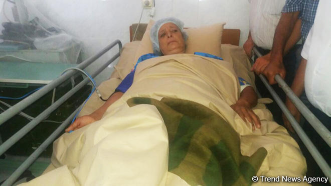 Azerbaijani MPs visit woman wounded by Armenian military provocation
