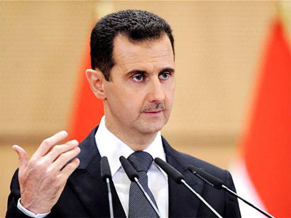 Syria's Assad says war still not won but West's plots foiled