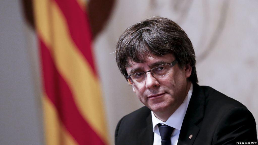 Let me come back, Catalan leader tells Spain