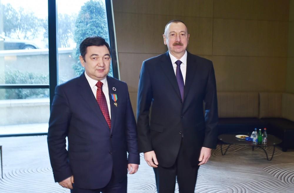 President Ilham Aliyev awards Order of Friendship to President of Int'l Turkish Academy [UPDATE]