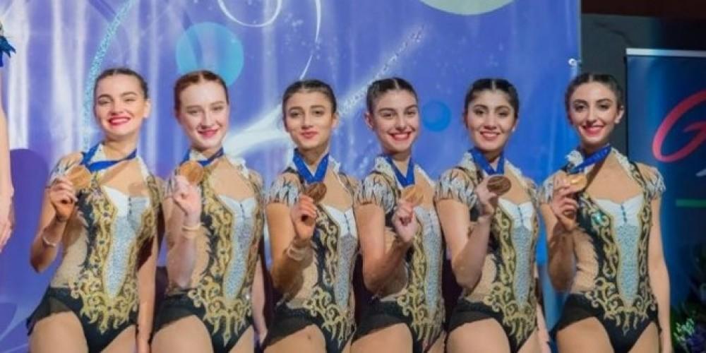 Graceful gymnasts win bronze in France