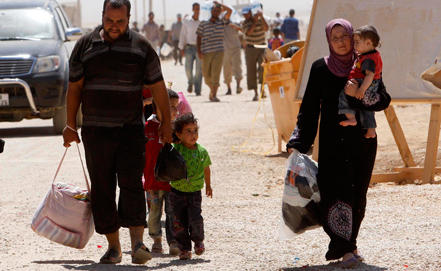 U.N. refugee agency urges Jordan to allow in Syrians fleeing air strikes