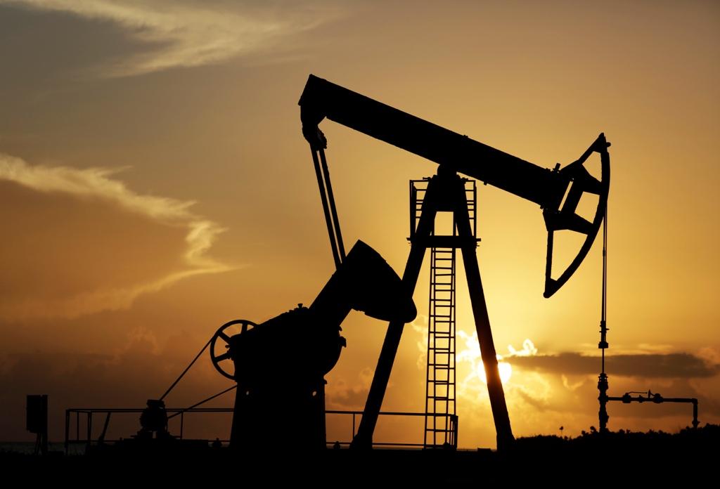 World crude prices edge down