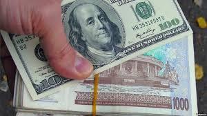 Uzbek soum up against U.S. dollar first time since August