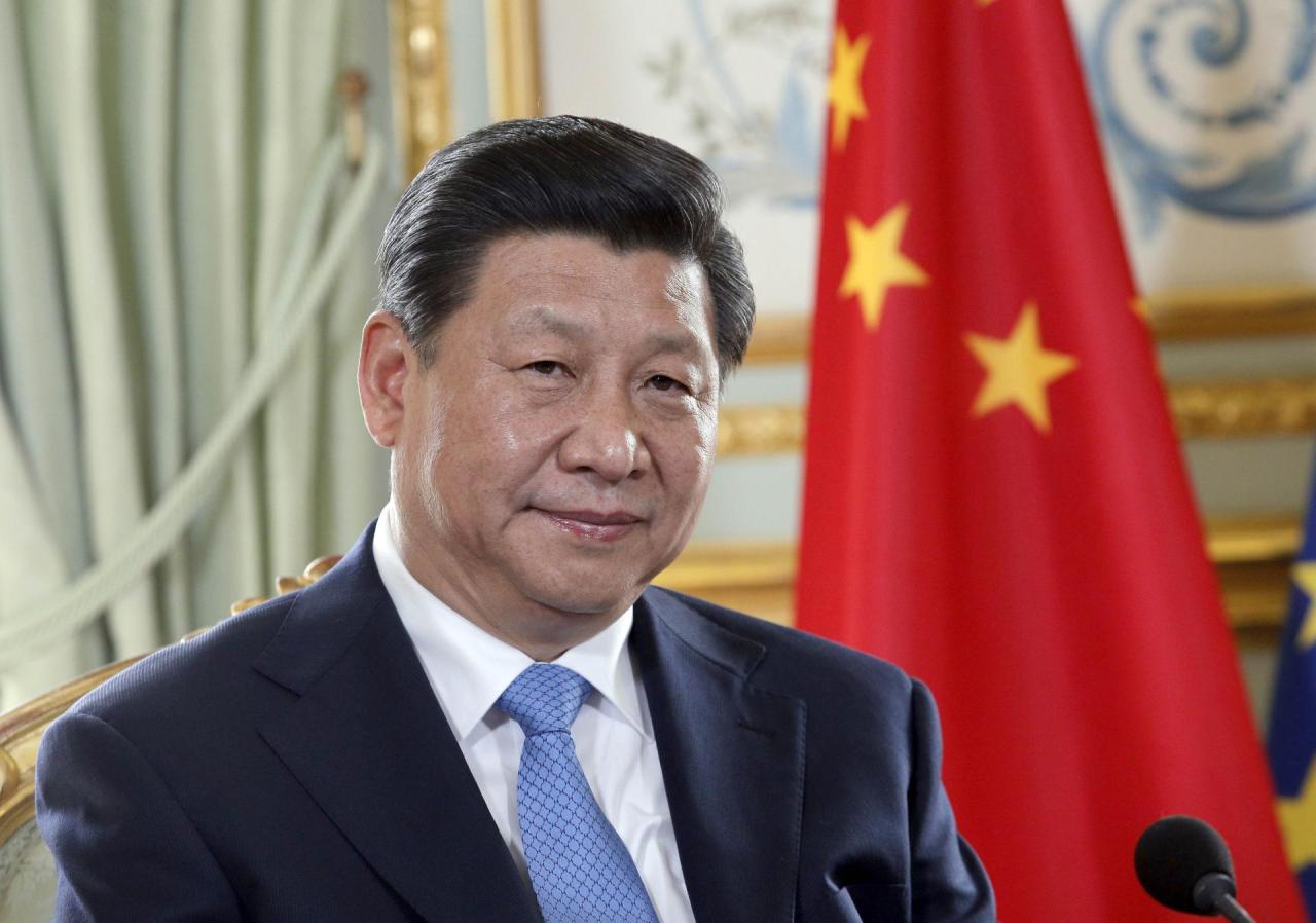 China's Xi urges financial risk prevention while seeking stable growth