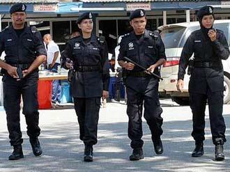 Malaysian police arrest 9 over terror links