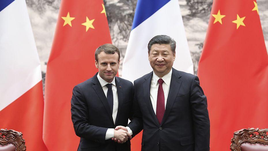 Xi meets Macron on maintaining sound China-France ties