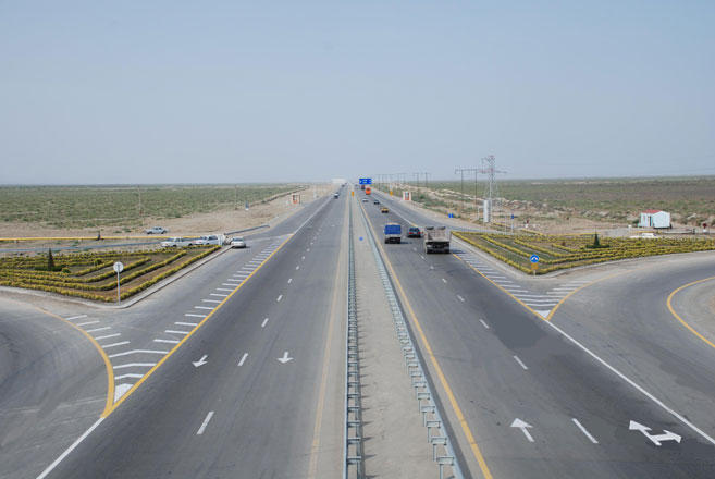Turkmenistan paving highway to Kazakh border