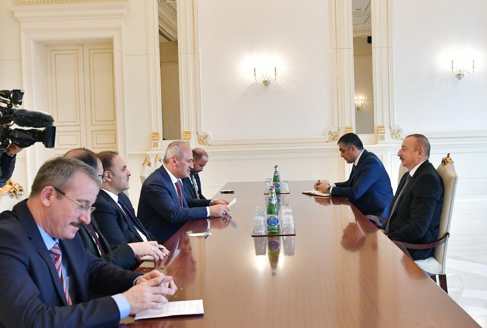 President Ilham Aliyev receives delegation led by Turkish minister of transport and infrastructure [UPDATE]