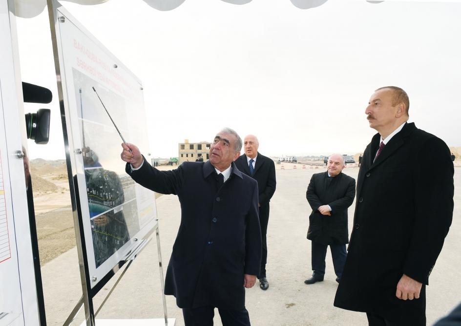 President Ilham Aliyev views construction at Baku-Guba-Russia state border highway [PHOTO]