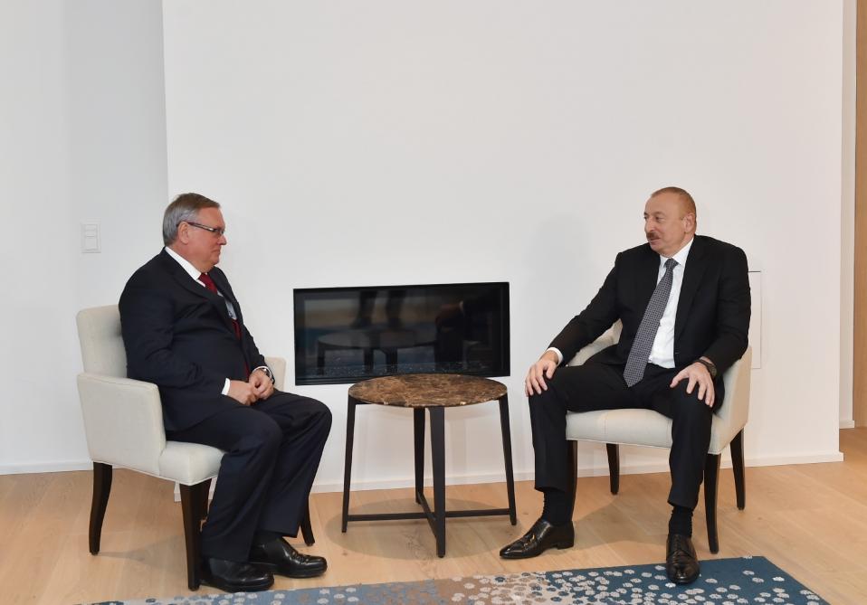 President Ilham Aliyev meets with President and Chairman of VTB Bank Management Board in Davos