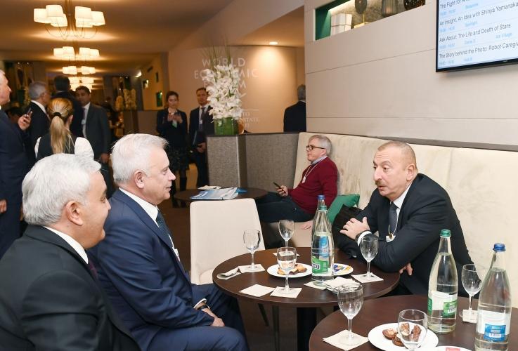 President Ilham Aliyev meets LUKOIL president in Davos [PHOTO]