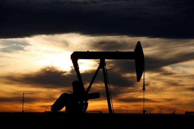 Oil gains but heading for weekly fall over coronavirus demand concerns