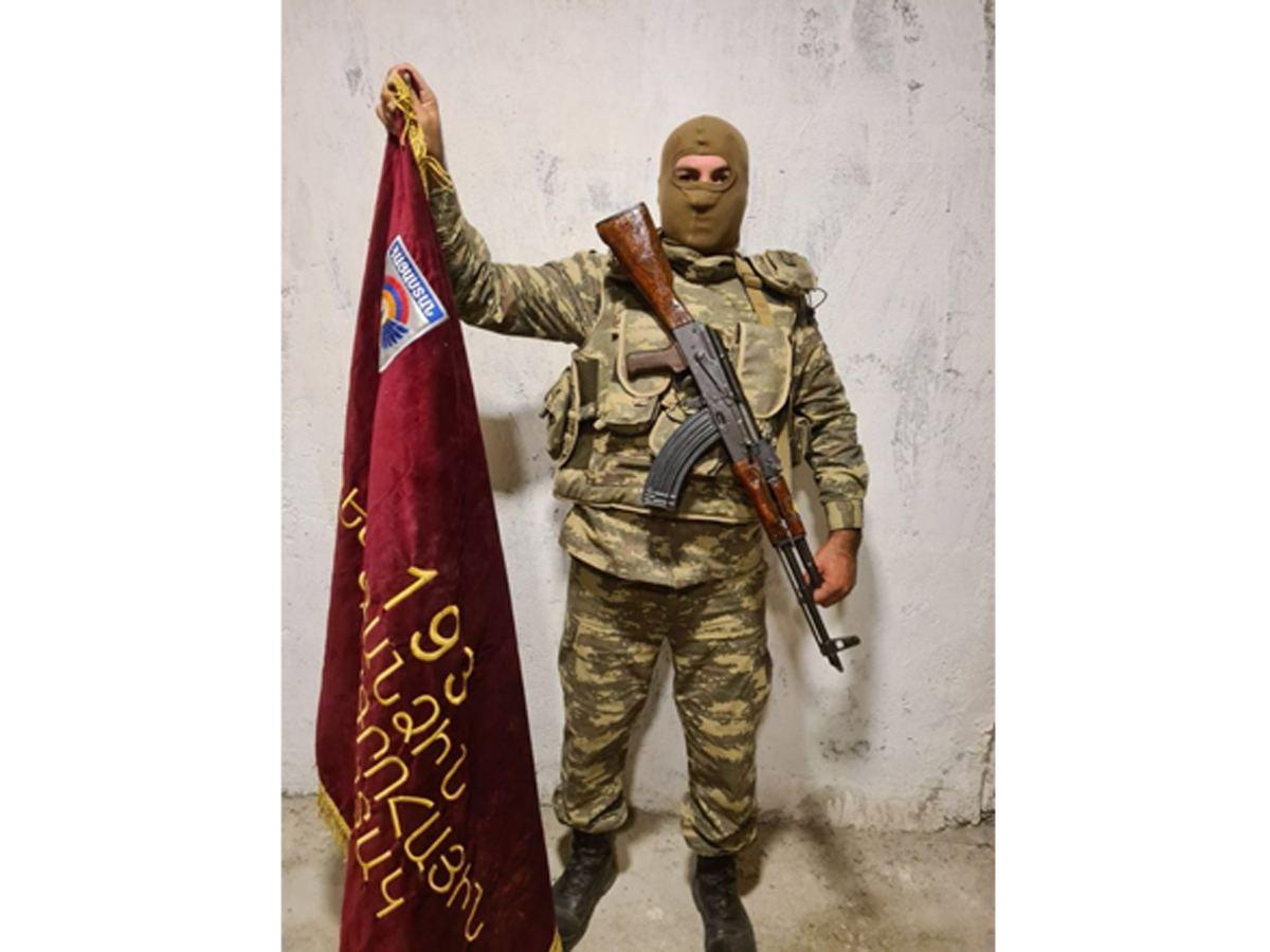 Azerbaijani army captures battle flag of Armenian battalion [PHOTO]