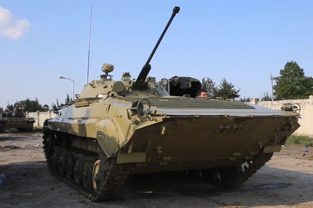 Captured military equipment of Armenian armed forces being repainted according to Azerbaijani military standards [VIDEO]