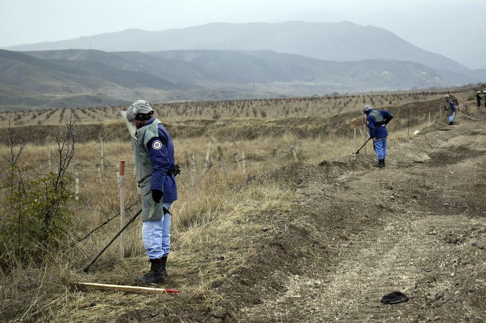 Azerbaijan continues demining road leading to liberated settlement