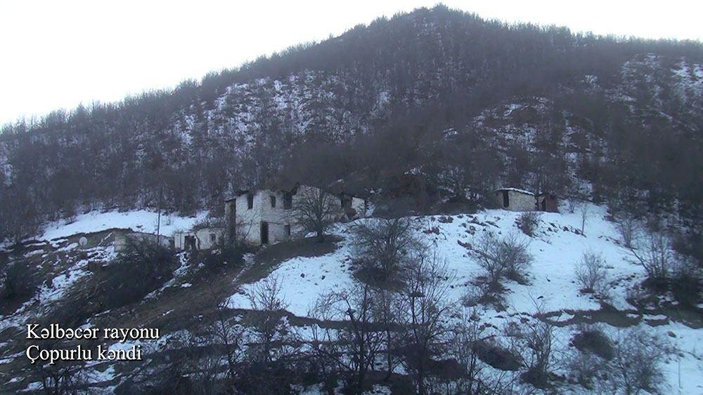 Azerbaijan shows footage from Chopurlu village of Kalbajar district