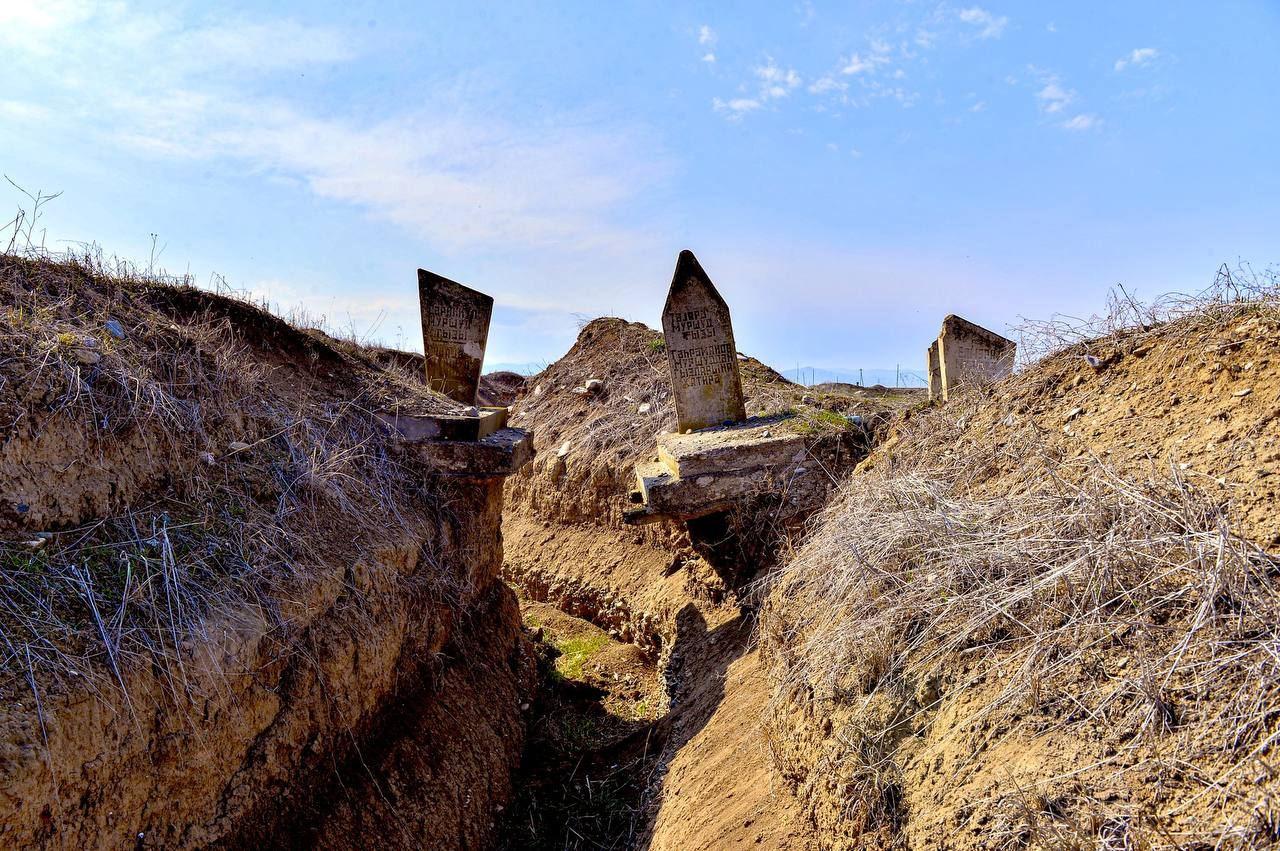 Armenian military trench found digged between graves in liberated Aghdam