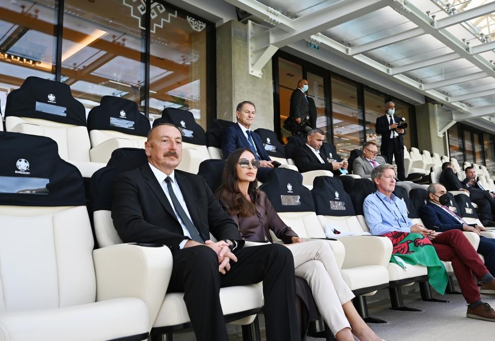 Azerbaijani president, first lady watch football match between Switzerland and Wales [PHOTO]