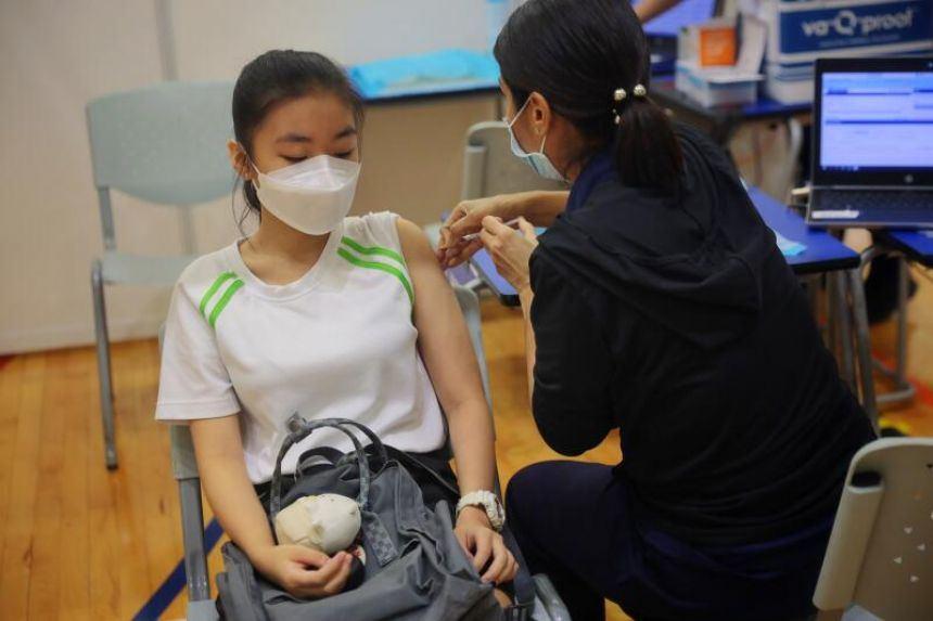 Singapore fully vaccinates 80 pct of population against COVID-19