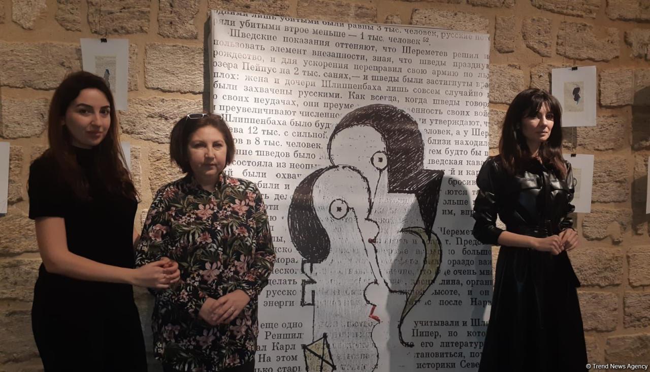 National artist draws caricatures on book pages [PHOTO]