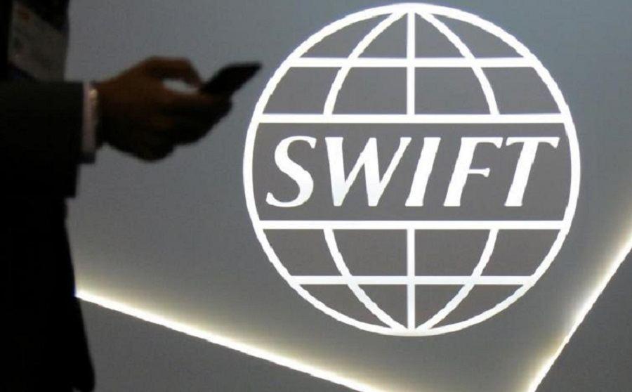 SWIFT says it preparing to comply with curbs on Russian banks