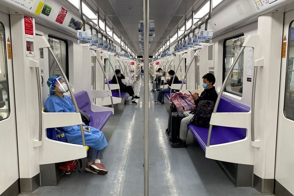 Shanghai reopens some public transport, still on high COVID alert