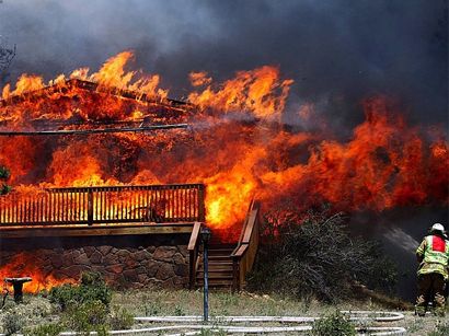 Wildfires burn, farmers struggle as another heatwave bakes western Europe