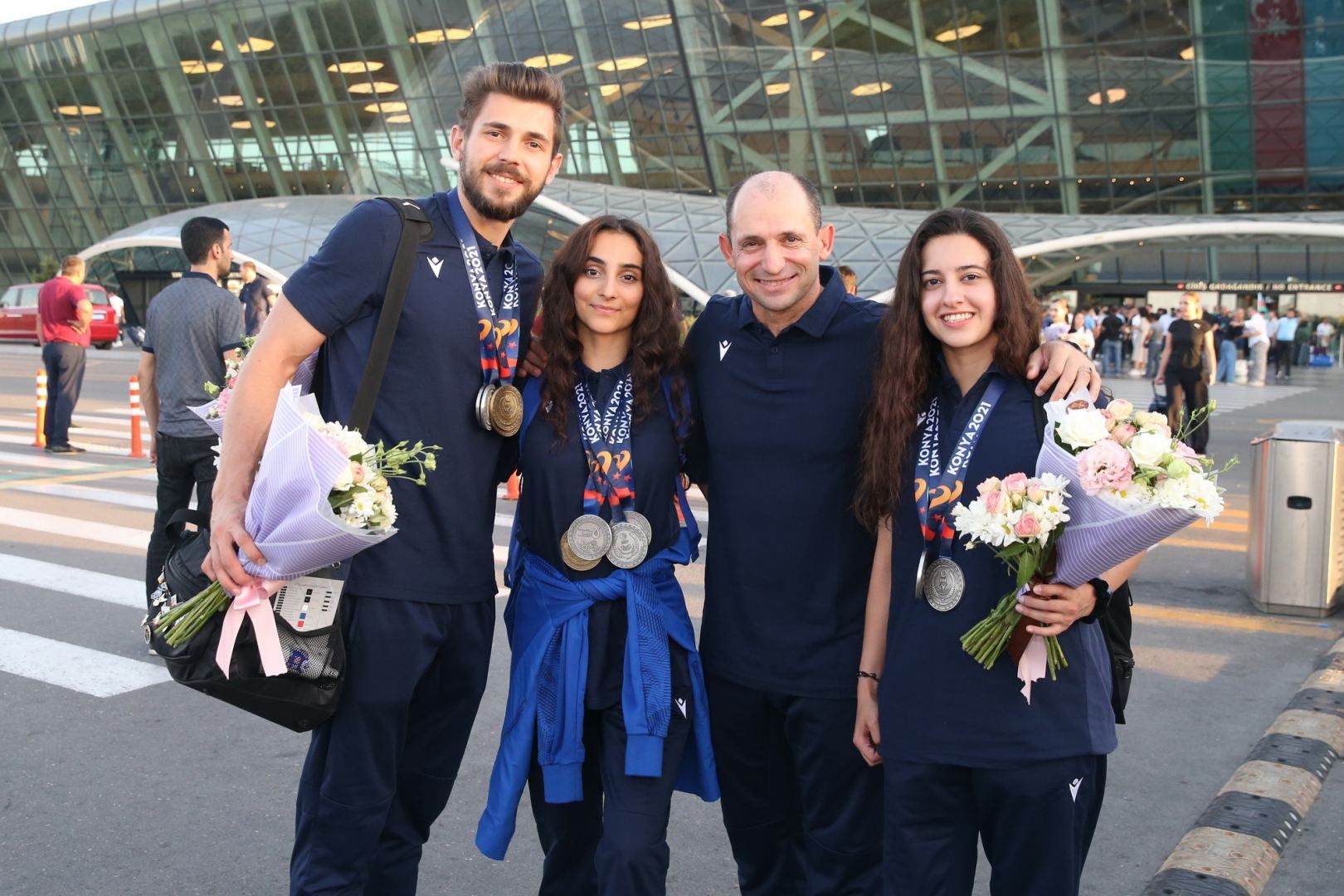 Azerbaijani gymnasts awarded with medals at V Islamic Solidarity Games return home [PHOTO] - Gallery Image