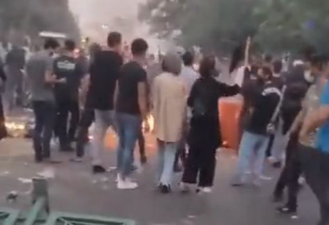 Protesters blocking avenue in Iran’s capital