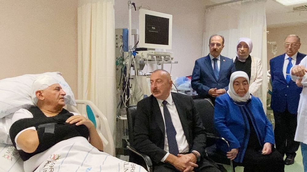 Azerbaijani president visits ex-Turkish premier in Baku hospital [PHOTO]