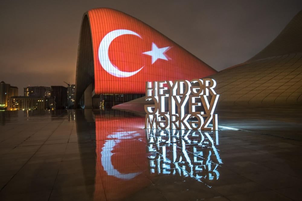 Heydar Aliyev Center in Baku lit up in colors of national flag of Turkiye in solidarity with quake victims [PHOTO/VIDEO] - Gallery Image
