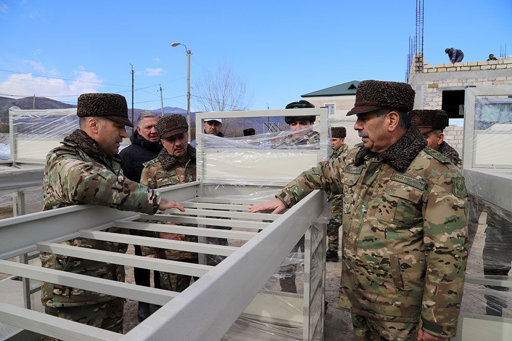 Azerbaijani defence chief inspects construction works in liberated territories [PHOTO/VIDEO]