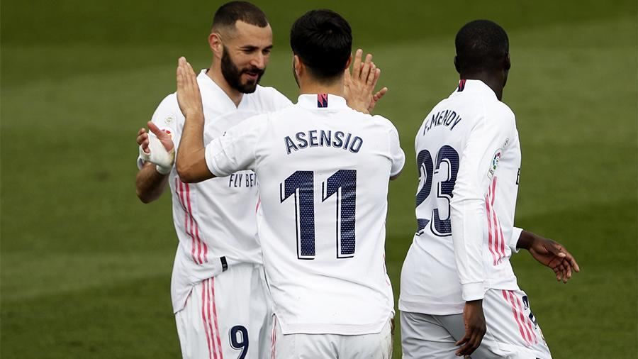 Real Madrid ease past Liverpool into Champions League quarters