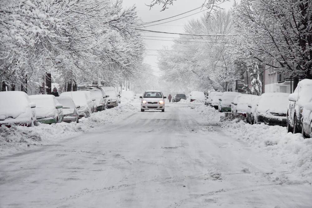 California flooded with rain, Northeast buried under snow