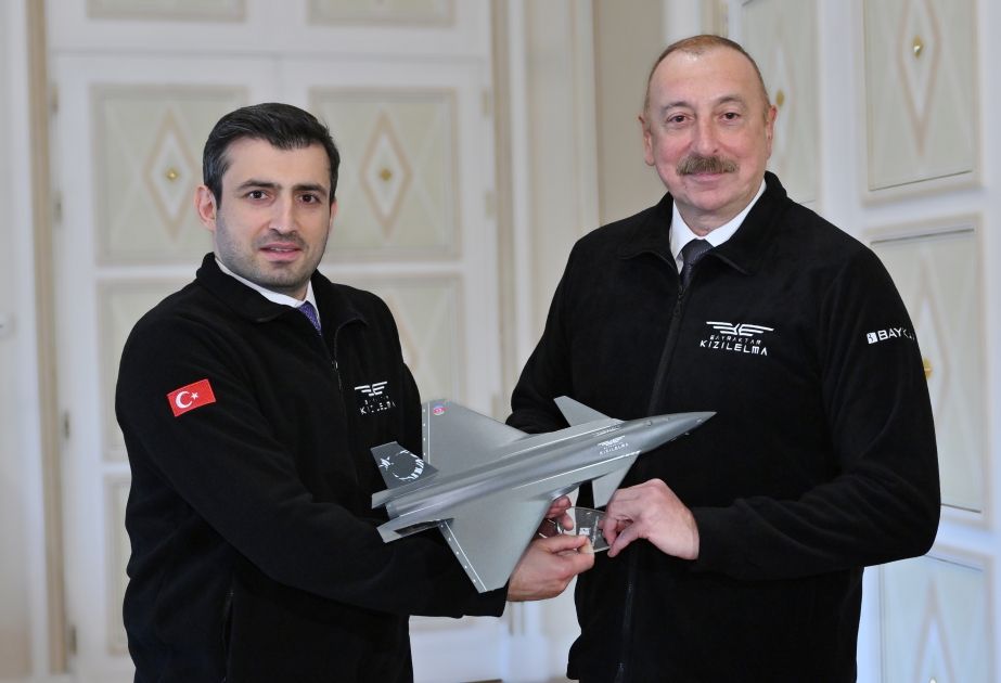 Selcuk Bayraktar presents keepsake to Azerbaijani President