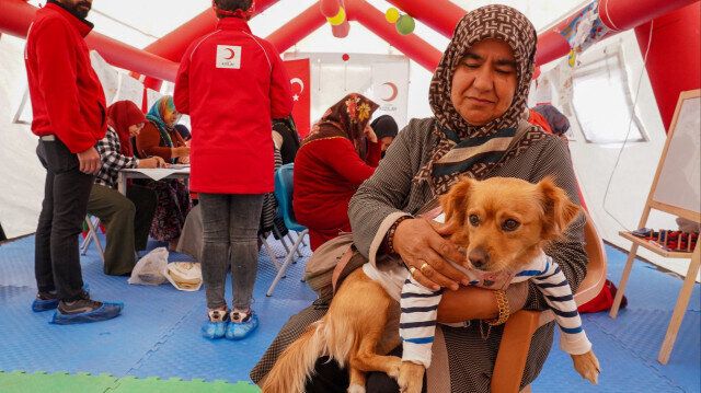 Quake survivor lives in tent with her dog who warned family just before disaster