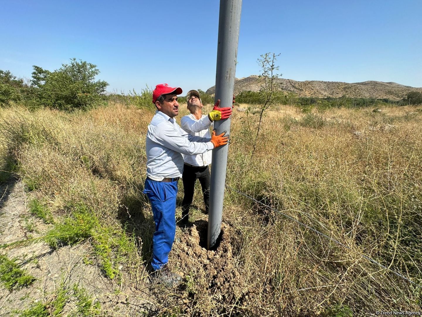 Azerbaijan installing power transmission line on Aghdam-Khankendi road [PHOTOS]