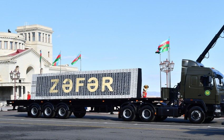 Armenian military vehicles' license plates demonstrated in military parade in Khankendi