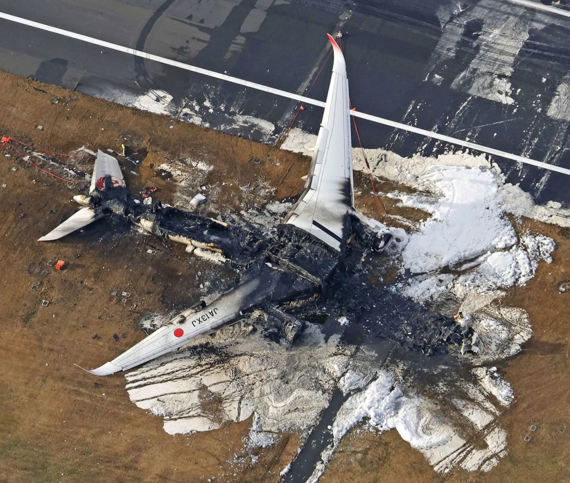 Airline pilots in Japan are unaware of a cabin fire until the crew informs them