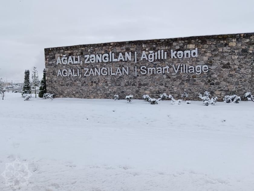 New residents of Azerbaijan's Aghali enjoy snowy view in village [PHOTOS]