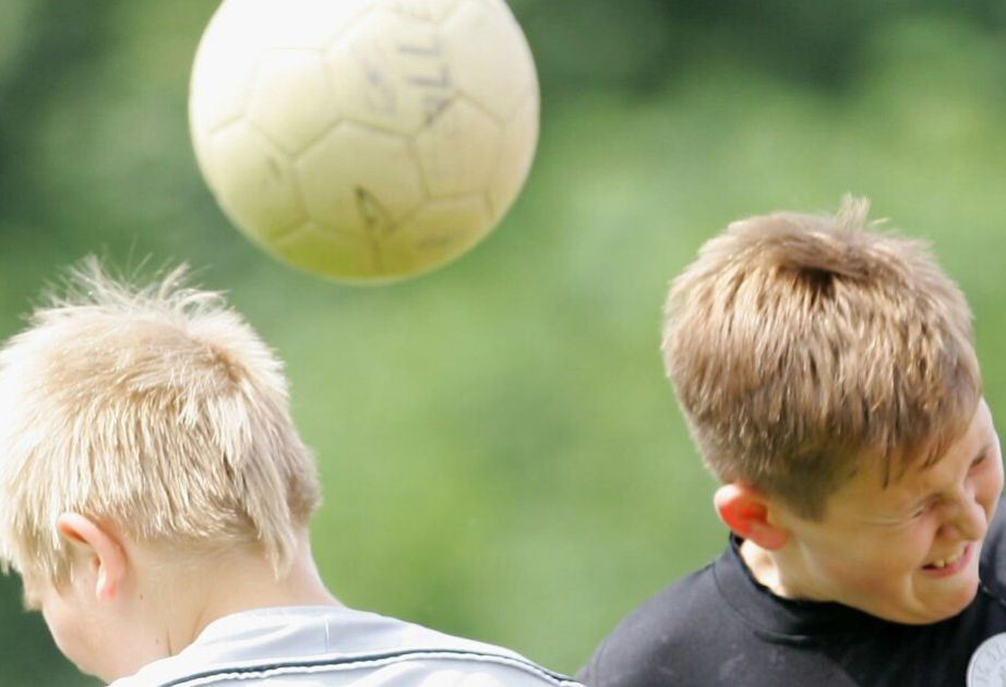 New rule banning heading in youth football games