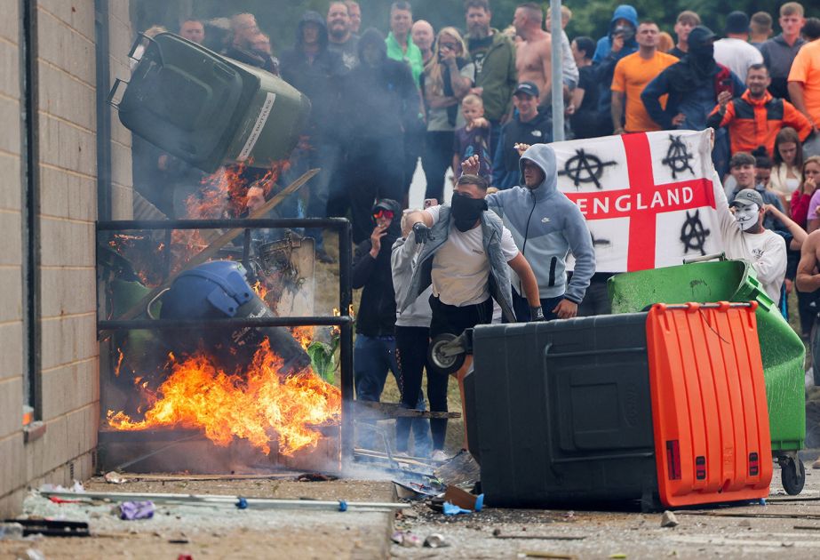 King in call for unity after 'aggression' of riots
