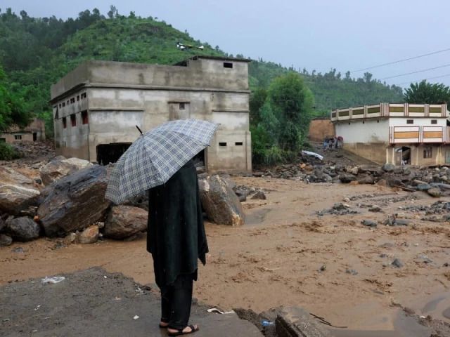 At least 13 dead after torrential rains hit northern China