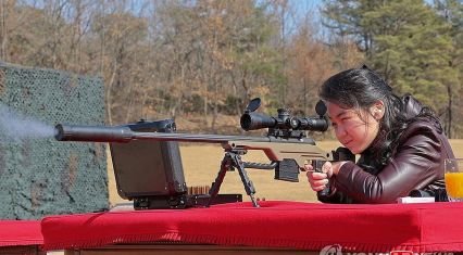 N. Korea releases rare photo of leader's daughter firing rifle