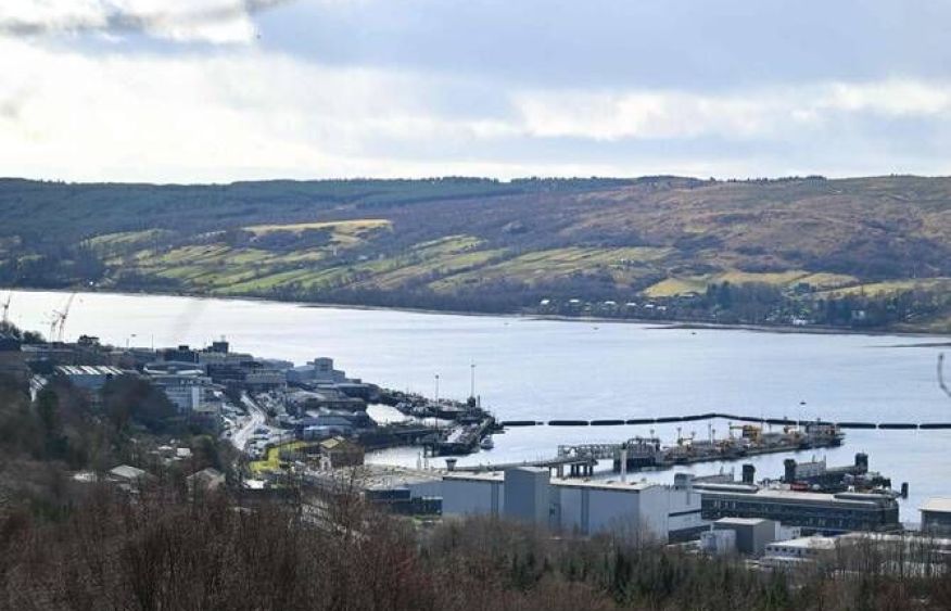 Iranian, Romanian charged for trying to enter UK naval base