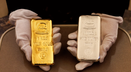 Gold prices fall as silver gains ground