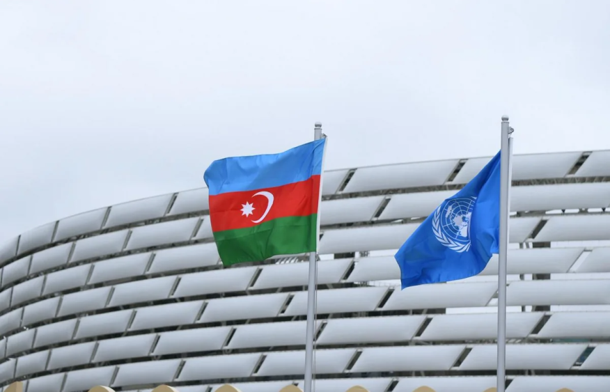 UN and Azerbaijani flags raised at Baku Olympic Stadium for WUF13 [VIDEO]