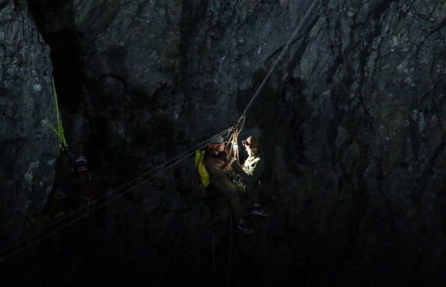 5 rescued from flooded Laos cave as search continues for 2 missing villagers
