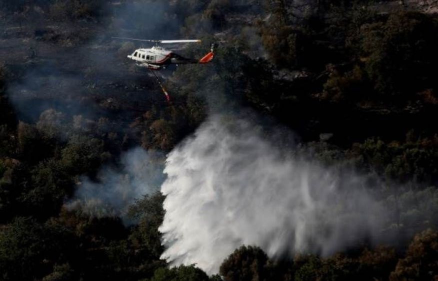 Two helicopters collide amid fires in Greece